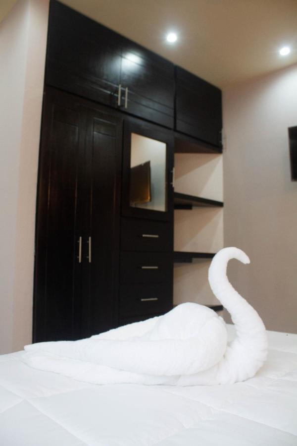 Apartamentos Michael Palenque Bagian luar foto